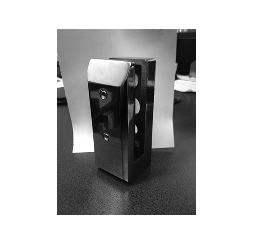 Face clamp for frameless glass balustrade panels